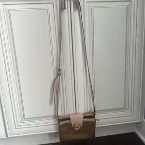 Small Michael Kors crossbody bag.